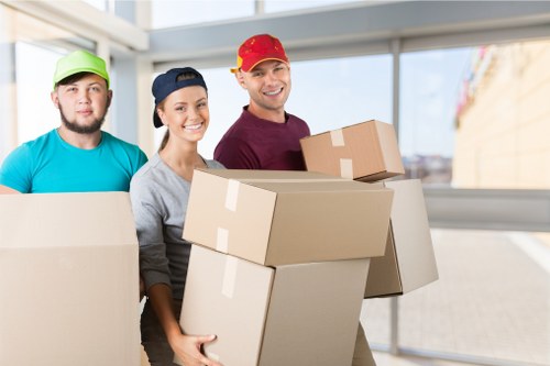Professional packing team handling household items in London