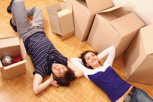 Furniture being carefully transported by a van in London
