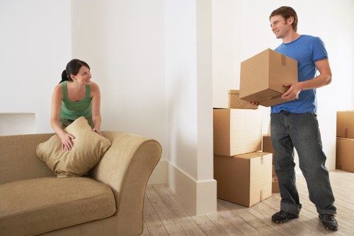 Professional removal team handling furniture